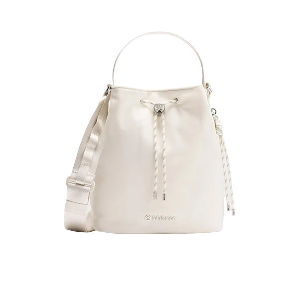 lululemon Unisex Drawstring Bucket Crossbody Bag 5L Light Ivory/Silver