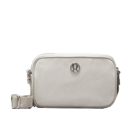 lululemon  Women's Crossbody Camera Bag 2L Canvas Mojave Tan Light Ivory Raw Linen