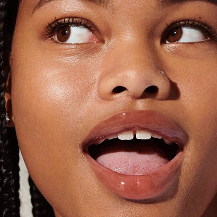 rhode peptide lip tint toast