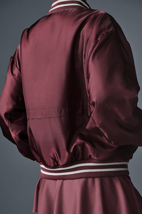 alo Women's Afterglow Varsity Jacket - Burgundy Truffle